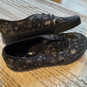 Vans Black Sneakers with Gold Symbols